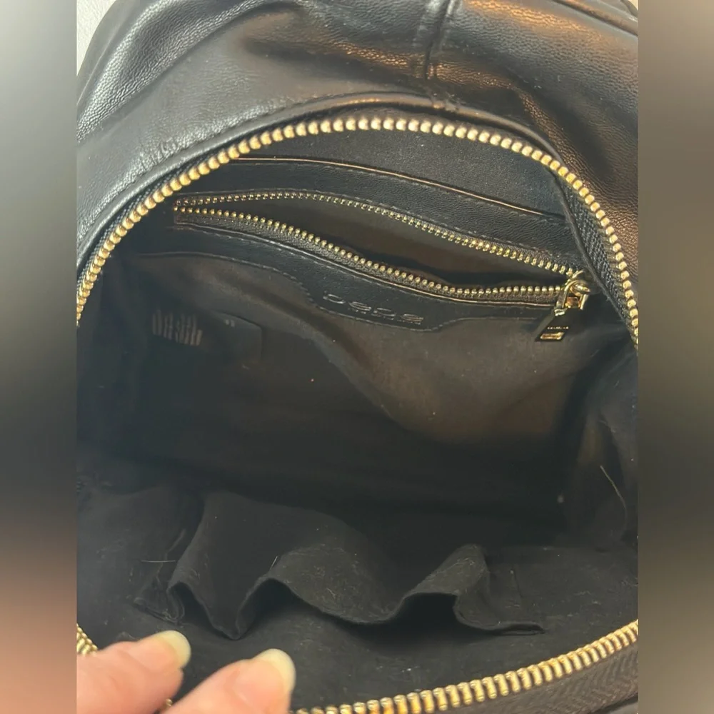 BEBE Black Faux Leather Quilted Mini Backpack Purse with Gold Chain Accent